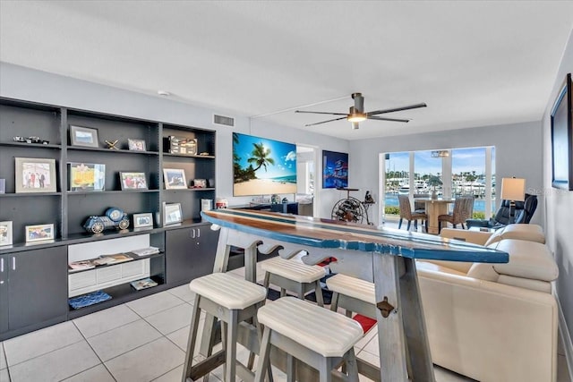 interior space featuring ceiling fan