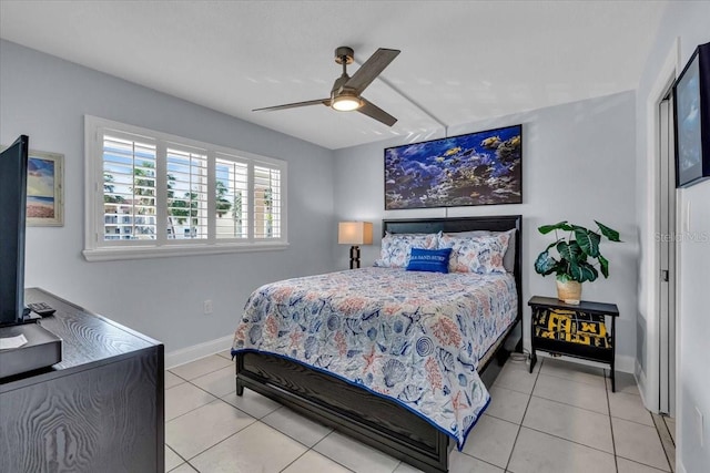 bedroom featuring ceiling fan and light tile patterned floors