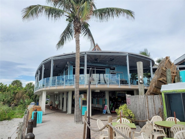 rear view of house featuring a balcony