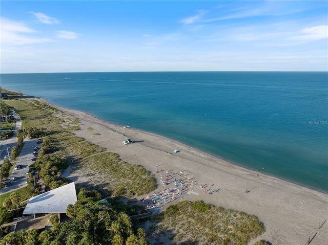 bird's eye view with a view of the beach and a water view