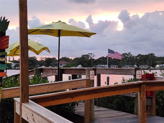 deck at dusk with a water view