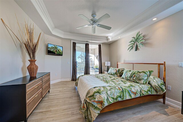 bedroom with access to outside, light hardwood / wood-style flooring, ceiling fan, and crown molding