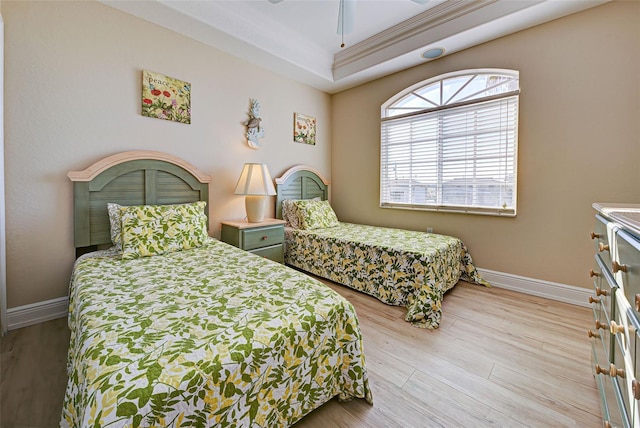 bedroom featuring light hardwood / wood-style floors and ceiling fan