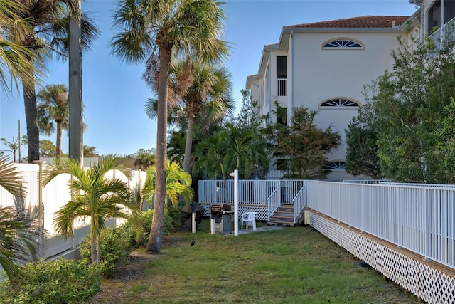 view of yard with a deck