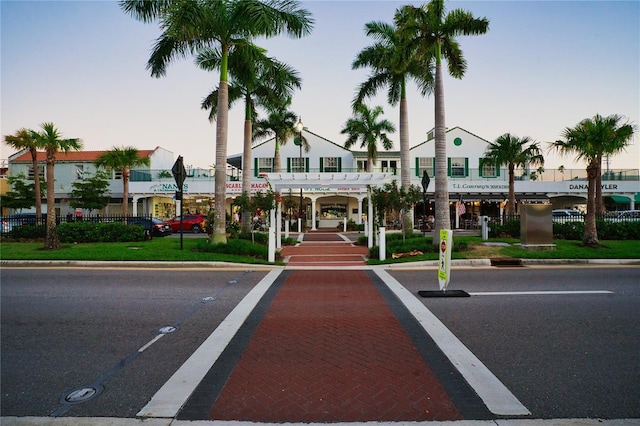 view of outdoor building at dusk