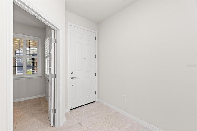 interior space featuring light tile patterned floors