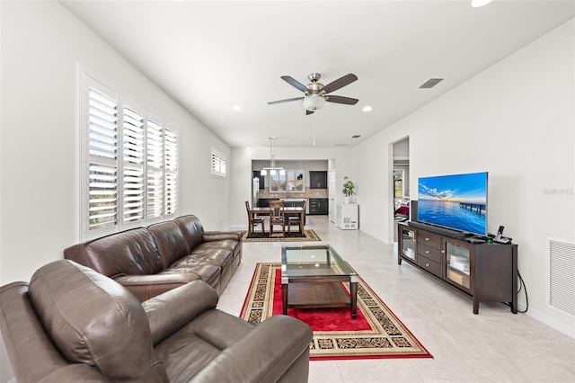 living room with ceiling fan