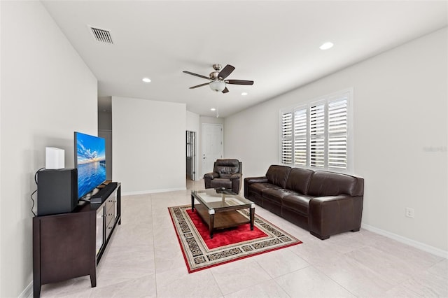 living room with ceiling fan