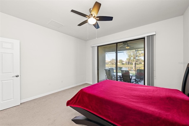 carpeted bedroom with access to exterior and ceiling fan