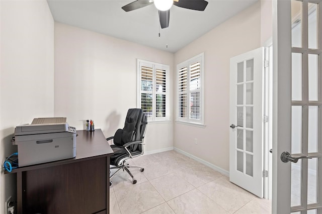 home office with ceiling fan, light tile patterned flooring, and french doors