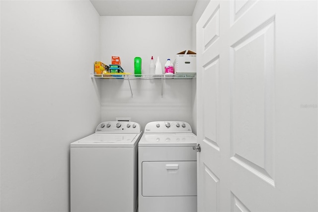 washroom featuring independent washer and dryer