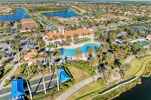 birds eye view of property featuring a water view