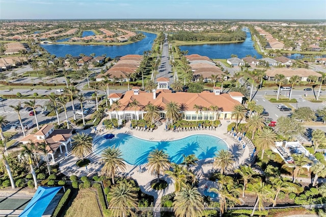 birds eye view of property featuring a water view