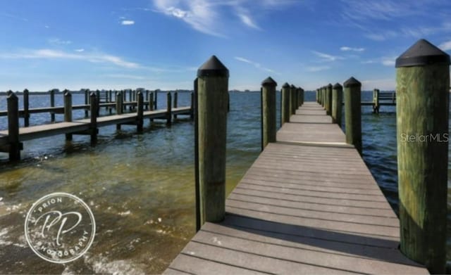 view of dock featuring a water view