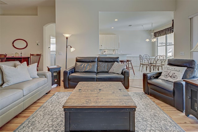 living room with light hardwood / wood-style floors