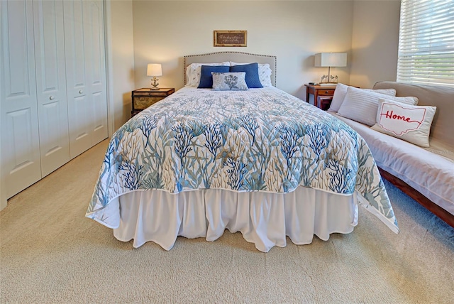 bedroom featuring a closet and carpet floors