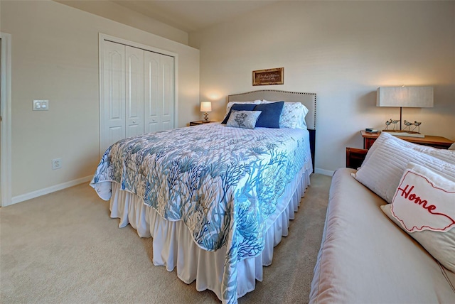 carpeted bedroom with a closet