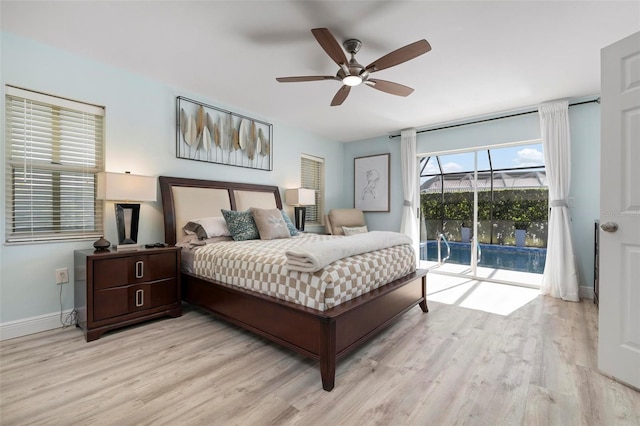 bedroom featuring access to exterior, light hardwood / wood-style flooring, and ceiling fan