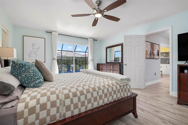 bedroom with ceiling fan, light wood-type flooring, and access to outside