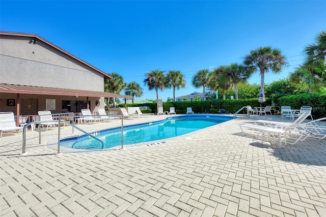 view of pool featuring a patio