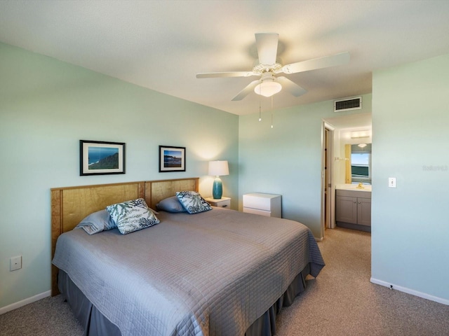950 Tarpon Center Dr Unit 202, Venice, FL 34285 - bedroom with light carpet, baseboards, and ceiling fan