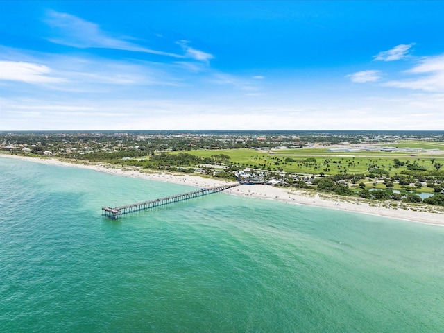 bird's eye view with a view of the beach and a water view