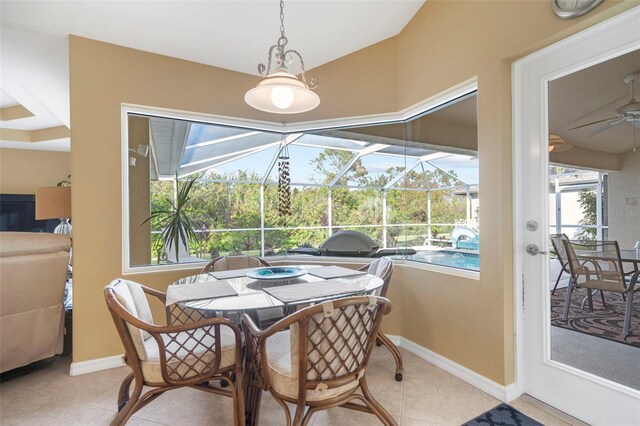150 Marker Rd, Rotonda West, FL 33947 - dining room featuring a sunroom, ceiling fan, light tile patterned floors, and vaulted ceiling