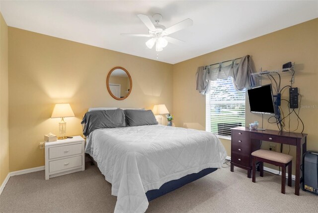 150 Marker Rd, Rotonda West, FL 33947 - bedroom featuring light carpet and a ceiling fan