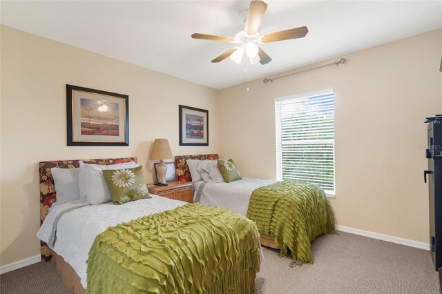150 Marker Rd, Rotonda West, FL 33947 - bedroom featuring light colored carpet and a ceiling fan