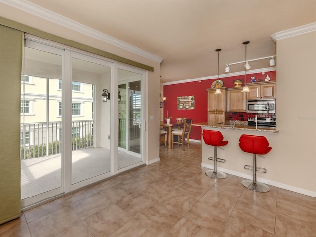 kitchen with appliances with stainless steel finishes, tasteful backsplash, ornamental molding, decorative light fixtures, and stone counters