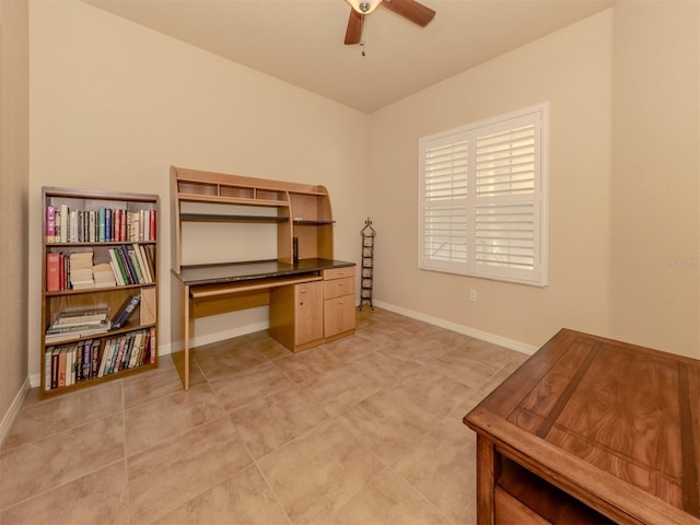 office area with ceiling fan and light tile patterned floors