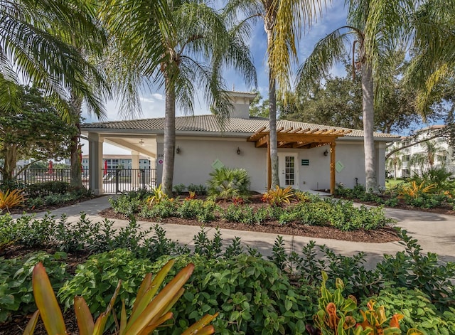 mediterranean / spanish-style house with ceiling fan