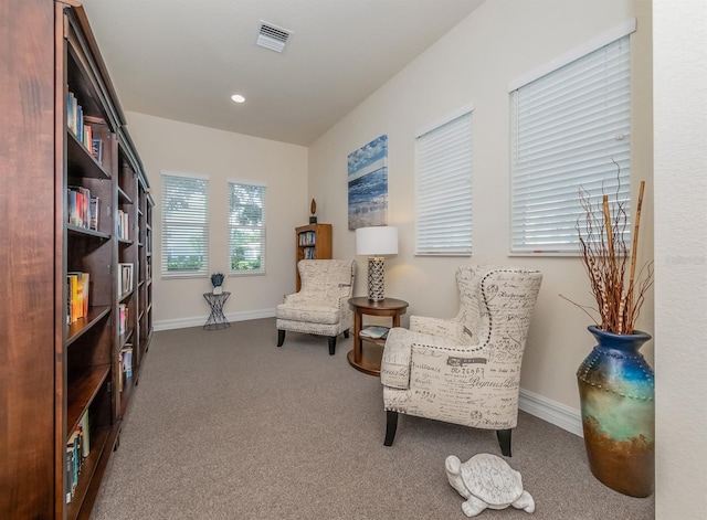 living area with carpet flooring