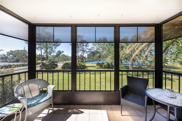 sunroom / solarium featuring plenty of natural light