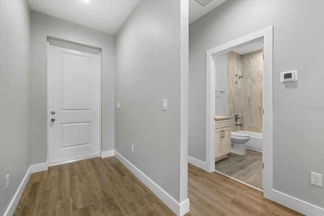 hall featuring light hardwood / wood-style floors