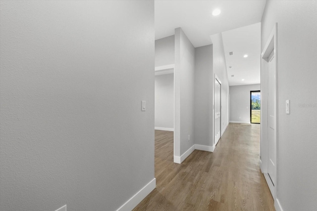 hallway featuring light wood-type flooring