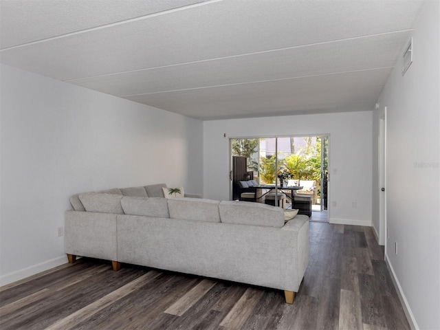 living room featuring dark hardwood / wood-style floors