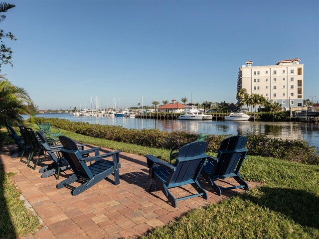 view of patio with a water view