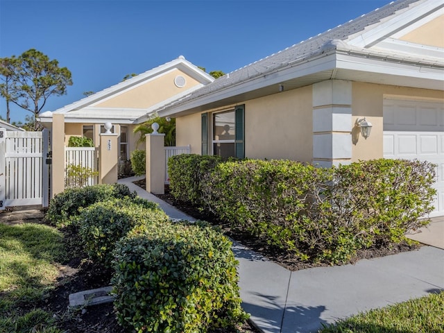 view of home's exterior featuring a garage