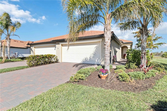 view of front of property with a garage