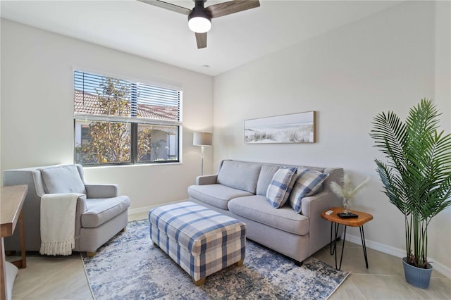 tiled living room with ceiling fan