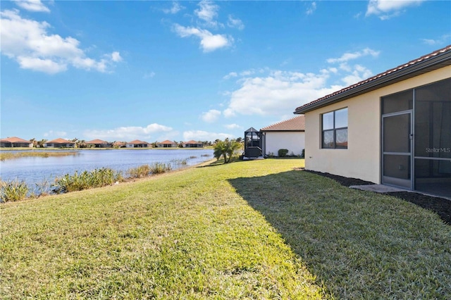 view of yard with a water view