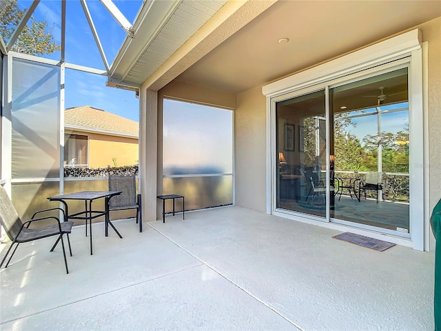 view of patio / terrace with a lanai