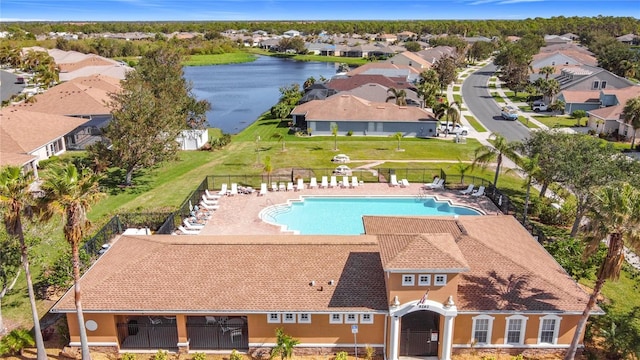 view of swimming pool with a water view