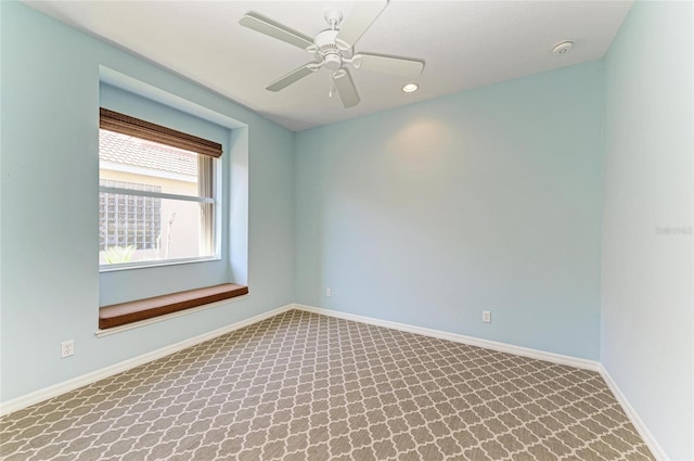 spare room with recessed lighting, carpet flooring, ceiling fan, and baseboards