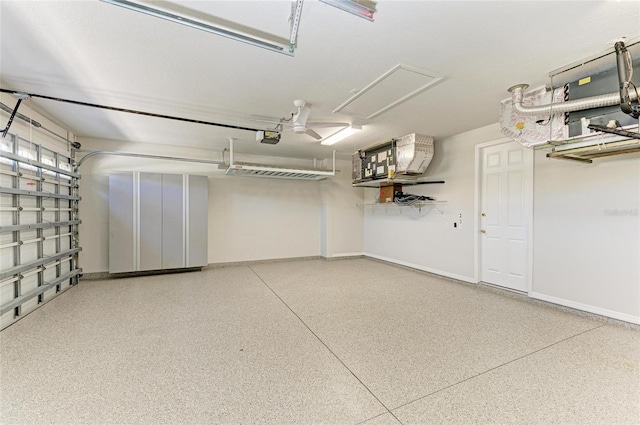 garage featuring baseboards and a garage door opener