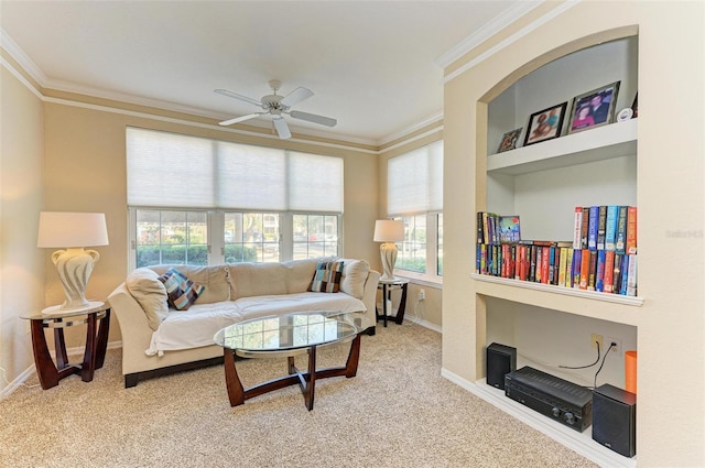 living room featuring carpet, crown molding, and a wealth of natural light