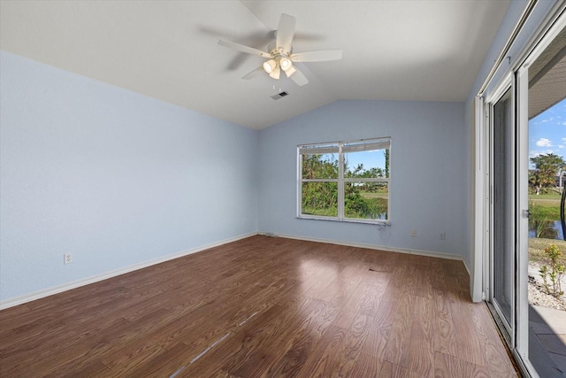 52 Fairway Rd, Rotonda West, FL 33947 - empty room featuring wood finished floors, ceiling fan, and lofted ceiling