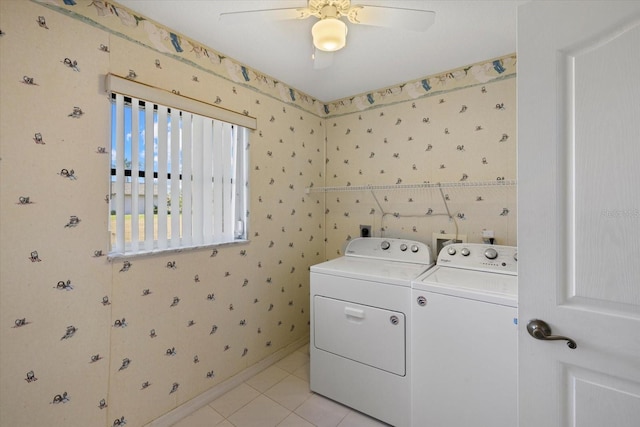 52 Fairway Rd, Rotonda West, FL 33947 - laundry area with washer and clothes dryer, a ceiling fan, and light tile patterned floors
