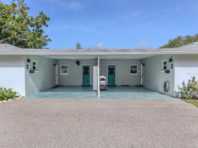 view of front of house featuring a carport